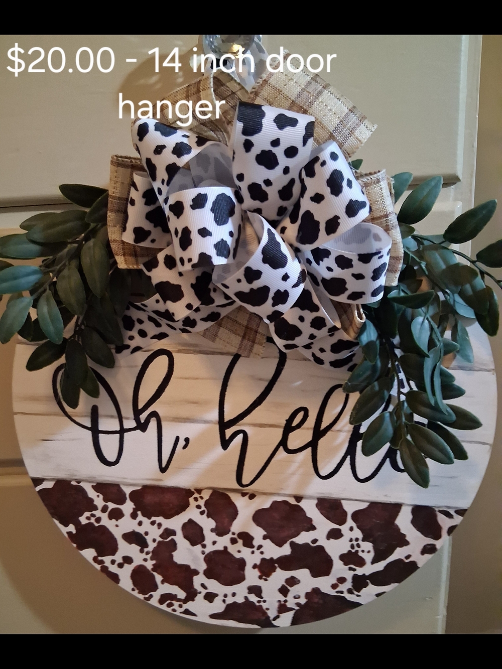 Cowhide Print "Oh, Hello" Round Door Hanger with Bow and Greenery